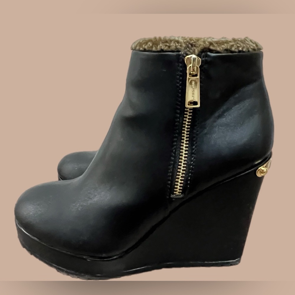 NIB Juicy Couture Black Wedge Boots with Gold Zipper Logo and Faux Fur lining.